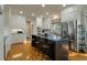 Inviting kitchen with a large island, stainless steel appliances, and custom cabinets offers space and functionality at 8642 W Fairway Woods Dr, North Charleston, SC 29420