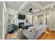 Cozy living room with coffered ceilings, fireplace, built-in shelving, and hardwood floors at 8642 W Fairway Woods Dr, North Charleston, SC 29420