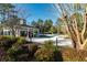 Community pool area featuring a large pool, covered pavilion, and playground at 8642 W Fairway Woods Dr, North Charleston, SC 29420