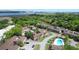 Aerial view of a community with a swimming pool and waterfront access with downtown views at 870 Colony Dr # A6, Charleston, SC 29407