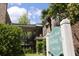 View of River's Bend exterior featuring well-maintained brick buildings and nicely manicured green spaces with a sign at 870 Colony Dr # A6, Charleston, SC 29407