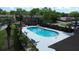 A refreshing community pool, perfect for relaxation and socializing with surrounding palm trees and lounge chairs at 870 Colony Dr # A6, Charleston, SC 29407