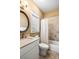 Bright bathroom featuring a tiled shower-tub combo, marble-look vanity, and classic fixtures for a clean aesthetic at 9 24Th Ave, Isle of Palms, SC 29451