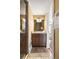 Bathroom featuring a modern vanity with dark wood cabinets and a tiled floor at 9 24Th Ave, Isle of Palms, SC 29451