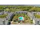 Aerial view of condos, swimming pool, and golf course at 9000 Palmetto Drive # D-304, Isle of Palms, SC 29451
