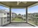 Beautiful balcony view overlooking the ocean, community pool and tropical landscaping at 9000 Palmetto Drive # D-304, Isle of Palms, SC 29451