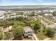 Stunning aerial view of coastal homes with beautiful landscaping and scenic marsh views at 1006 Basin Ln, Johns Island, SC 29455