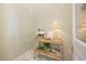 Stylish coffee bar area featuring a woven cart, espresso machine and unique decorative wall at 1006 Basin Ln, Johns Island, SC 29455