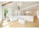 Spacious living room featuring hardwood floors, custom decor, and lots of natural light at 1006 Basin Ln, Johns Island, SC 29455