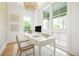 Bright office space with natural light, white desk, and contemporary decor at 1006 Basin Ln, Johns Island, SC 29455