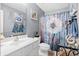 Full bathroom with painted grey walls, commode, and a shower and bathtub combination at 104 Buchanan Cir, Goose Creek, SC 29445