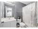 Full bathroom features commode, and shower and tub combination behind white curtain at 104 Buchanan Cir, Goose Creek, SC 29445