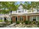 Charming townhouse with brick facade and well-maintained landscaping at 104 Buchanan Cir, Goose Creek, SC 29445