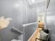 Second floor hallway with grey walls and wood-look floors leads to the bedrooms at 104 Buchanan Cir, Goose Creek, SC 29445