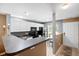 Open concept kitchen with breakfast bar and view of the entryway at 104 Buchanan Cir, Goose Creek, SC 29445