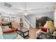 Open living room with stairs and an eat-in kitchen at 104 Buchanan Cir, Goose Creek, SC 29445