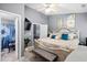 This main bedroom features a large bed with teal accents and en suite bathroom at 104 Buchanan Cir, Goose Creek, SC 29445