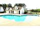 Inviting community pool with a bathhouse and ample space for relaxing and enjoying the outdoors at 104 Buchanan Cir, Goose Creek, SC 29445