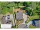 Aerial view showcasing the property's lot lines, mature trees, and circular driveway at 105 Aviary Ct, Summerville, SC 29483