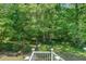 Wooded views abound from back deck and are perfect for enjoying nature at 105 Aviary Ct, Summerville, SC 29483