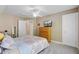 Bedroom featuring a bed, dresser with TV, and doorways that invite exploration and relaxation at 105 Aviary Ct, Summerville, SC 29483