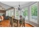 Bright dining area with chandelier and views to outdoors at 105 Aviary Ct, Summerville, SC 29483