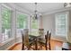 Bright dining area with chandelier and wooden table at 105 Aviary Ct, Summerville, SC 29483