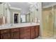 Beautiful main bathroom features dual vanity, a glass shower, and great lighting, creating a spa-like experience at 105 Aviary Ct, Summerville, SC 29483