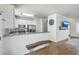Bright kitchen with granite countertops, stainless steel appliances, and a cozy wooden bench at 107 Amaranth Ave, Summerville, SC 29483