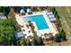 Aerial view of a community pool with seating areas, palm trees and cabanas at 112 Starling St, Summerville, SC 29483