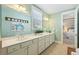 Well-lit bathroom with dual vanities, quartz countertops, and a calming aesthetic at 112 Starling St, Summerville, SC 29483