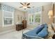Sunlit bedroom with a daybed, a desk, and two large windows at 112 Starling St, Summerville, SC 29483