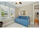 Cozy bedroom with blue accents, a comfortable daybed, and natural light from the large window at 112 Starling St, Summerville, SC 29483