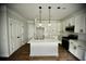Modern kitchen with white cabinets, stainless steel appliances, and quartz countertops at 1178 Braddock Ave, North Charleston, SC 29406