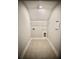 A bright laundry room features tile floors and a shelf at 1178 Braddock Ave, North Charleston, SC 29406