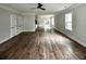 Bright living room with hardwood floors and modern ceiling fan at 1178 Braddock Ave, North Charleston, SC 29406