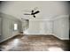 Spacious living room with hardwood floors, and staircase at 1178 Braddock Ave, North Charleston, SC 29406
