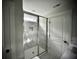 The bathroom features a glass door shower with marble tile and a built-in niche for toiletries at 1178 Braddock Ave, North Charleston, SC 29406