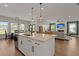 Open kitchen with an island, granite countertops, stainless steel appliances, and eat in kitchen at 118 Jesup Ct, Ridgeville, SC 29472