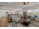 Open-concept living room with views of the kitchen and dining area, great for entertaining guests at 118 Jesup Ct, Ridgeville, SC 29472