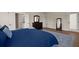 Spacious main bedroom featuring hardwood floors, ensuite bathroom, and natural light at 118 Jesup Ct, Ridgeville, SC 29472