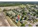 An aerial view of a home in a suburban neighborhood with a pool at 118 Netherfield Dr, Summerville, SC 29486