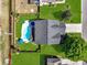An aerial view of the home showcasing the backyard oasis with pool and lush landscaping at 118 Netherfield Dr, Summerville, SC 29486