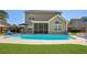Inviting backyard with a refreshing swimming pool, outdoor seating, and well-maintained green lawn at 118 Netherfield Dr, Summerville, SC 29486