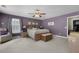 This bedroom features neutral walls, a comfortable bed, and a large window for plenty of natural light at 118 Netherfield Dr, Summerville, SC 29486