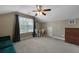 Spacious bonus room features a small table and natural light at 118 Netherfield Dr, Summerville, SC 29486