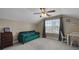 Cozy bonus room features a bright window, couch, and a ceiling fan at 118 Netherfield Dr, Summerville, SC 29486
