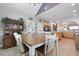Open floor plan dining room with views of the kitchen, stainless steel appliances, and natural lighting at 118 Netherfield Dr, Summerville, SC 29486