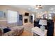 Inviting living room featuring a fireplace, built-in shelving, and hardwood floors at 118 Netherfield Dr, Summerville, SC 29486