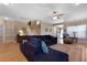 Open-concept living room with hardwood floors, comfortable seating, and staircase access at 118 Netherfield Dr, Summerville, SC 29486